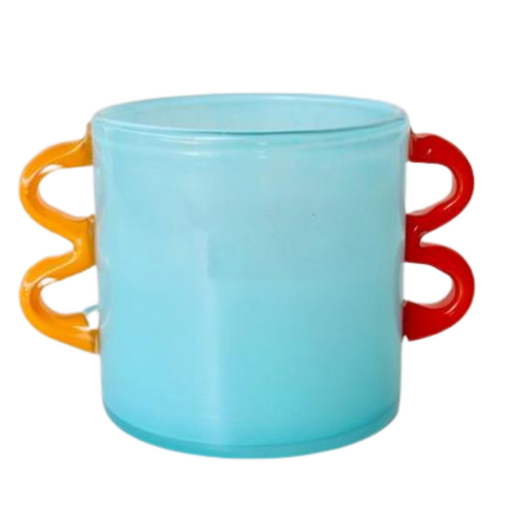 Aqua Blue Glass Vase with Orange Handles
Elevate your space with this stunning handcrafted Aqua Blue Glass Vase, featuring vibrant orange handles. Its unique design adds a pop of color and elegance to any room.Unique Boys.
