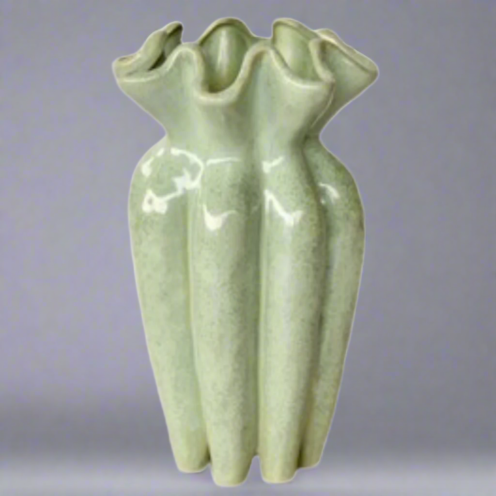 Aqua Green Fluted Ceramic Vase 31X18cm: A Stunning Decorative Piece
Add a pop of color and elegance to your home with our expertly crafted Aqua Green Fluted Ceramic Vase 31X18cm. This unique piece is sure to elevate your interior design. www.uniqueboys.co.za