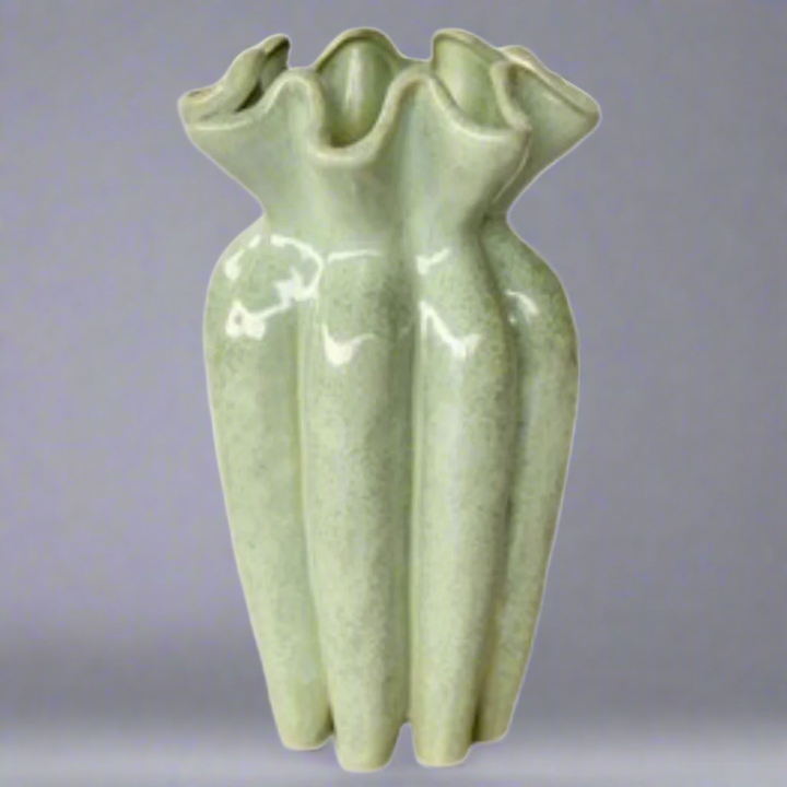Aqua Green Fluted Ceramic Vase 31X18cm: A Stunning Decorative Piece
Add a pop of color and elegance to your home with our expertly crafted Aqua Green Fluted Ceramic Vase 31X18cm. This unique piece is sure to elevate your interior design. www.uniqueboys.co.za