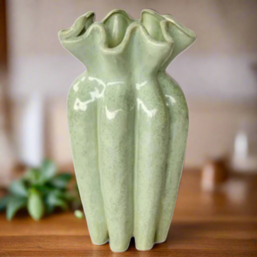 Aqua Green Fluted Ceramic Vase 31X18cm: A Stunning Decorative Piece
Add a pop of color and elegance to your home with our expertly crafted Aqua Green Fluted Ceramic Vase 31X18cm. This unique piece is sure to elevate your interior design
