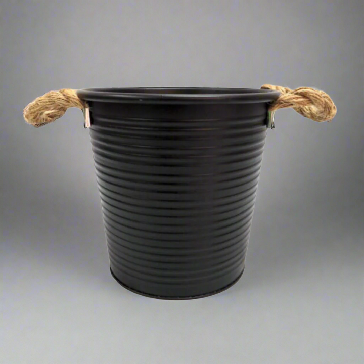 Add a Touch of Vintage Charm with the Encounter Bucket
Elevate your décor with the Encounter Bucket, a unique and versatile vintage-inspired pot perfect for indoor or outdoor use.
Vintage-Inspired Design
This stunning pot boasts an antique design that adds a touch of history and character to any space. Its convenient size (21.5cm x 16cm x 20cm) makes it easy to arrange flowers, leaves, or branches, creating a beautiful display that adds style and charm to your home or garden.
Key Features
Vintage-inspired