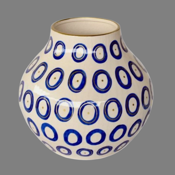 Extra Large Blue Circle Ceramic Vase Gold Trim 37X34cm
Elevate your home decor with our stunning Extra Large Blue Circle Ceramic Vase Gold Trim 37X34cm. Handcrafted with precision and care, this unique vase features a beautiful design that adds a touch of elegance to any room. Its striking is sure to become a focal point in your space, and its large size makes it perfect for showcasing your favorite flowers or branches. Unique Boys.