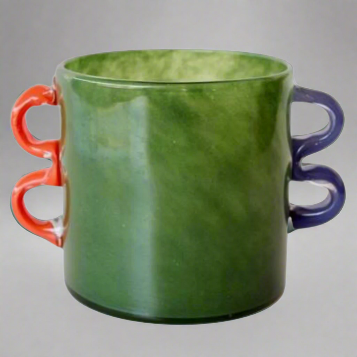 Green Glass Vase with Orange and Blue Handles
Elevate your home decor with this stunning Green Glass Vase, expertly designed and crafted to add a touch of modern elegance to any room. The vibrant orange and blue handles create a unique and eye-catching look that's sure to impress. Unique Boys.