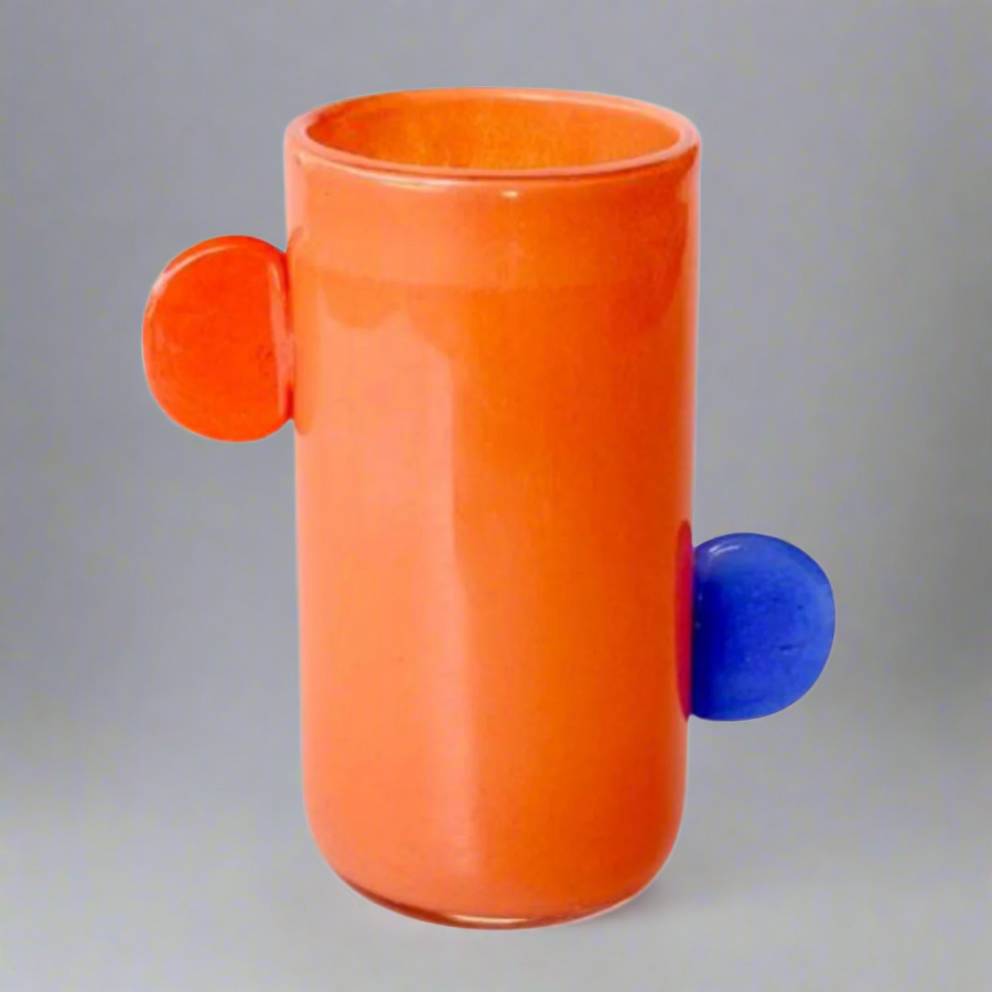 Orange Glass Vase with Blue Accents and Orange Handles
Add a pop of vibrant color to your home decor with this expertly crafted Orange Glass Vase featuring blue accents and stylish orange handles. Measuring 24x20x12cm, this stunning vase is perfect for elevating any room's style. Unique Boys.