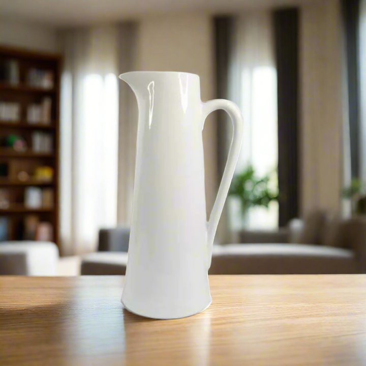 Port 1 Jug
The Port 1 Jug is a versatile and functional addition to your home decor. Measuring 19 X 15.5 X 37.5, this jug doubles as a planter, adding a touch of greenery to your space. Its sleek white design will effortlessly complement any style, making it a must-have for both practical and aesthetic purposes.