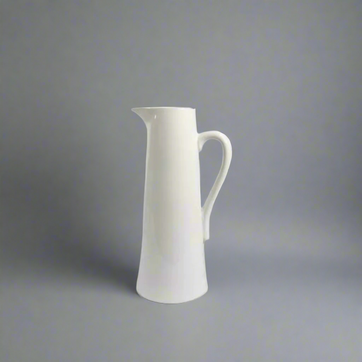 Port 2 Jug
The Port 2 Jug is a versatile and functional addition to your home decor. Measuring 16 X 12.5 X 30CM, this jug doubles as a planter, adding a touch of greenery to your space. Its sleek white design will effortlessly complement any style, making it a must-have for both practical and aesthetic purposes.