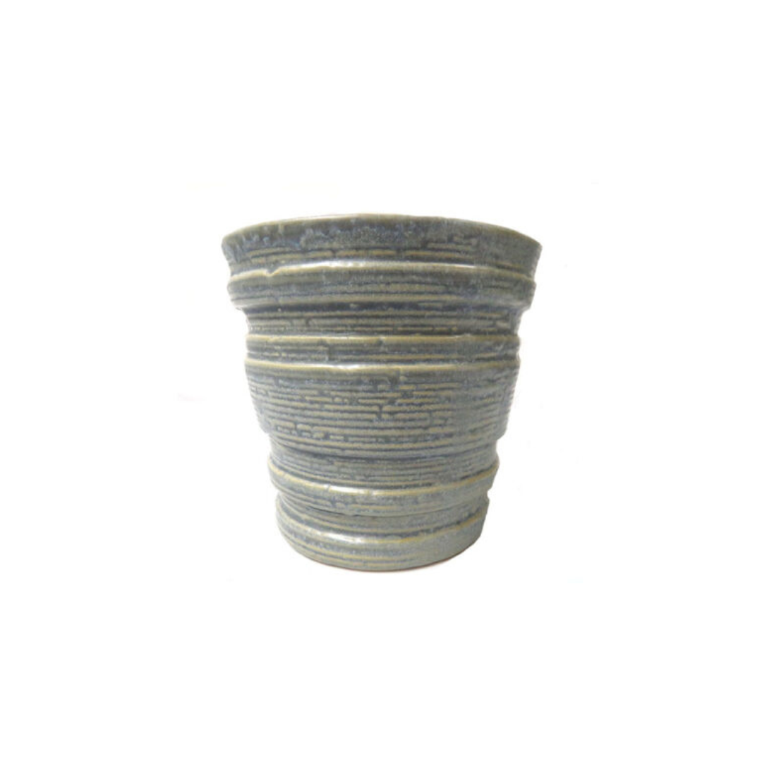 Saturna Pot Crafted with a gorgeous texture and pale blue wash, the Saturna Pot measures 16.5cm x 15cm. This pot is perfect for adding an elegant touch to any space and can easily complement a variety of decor styles. Made with high-quality materials, it is both durable and stylish. UNIQUE Boys