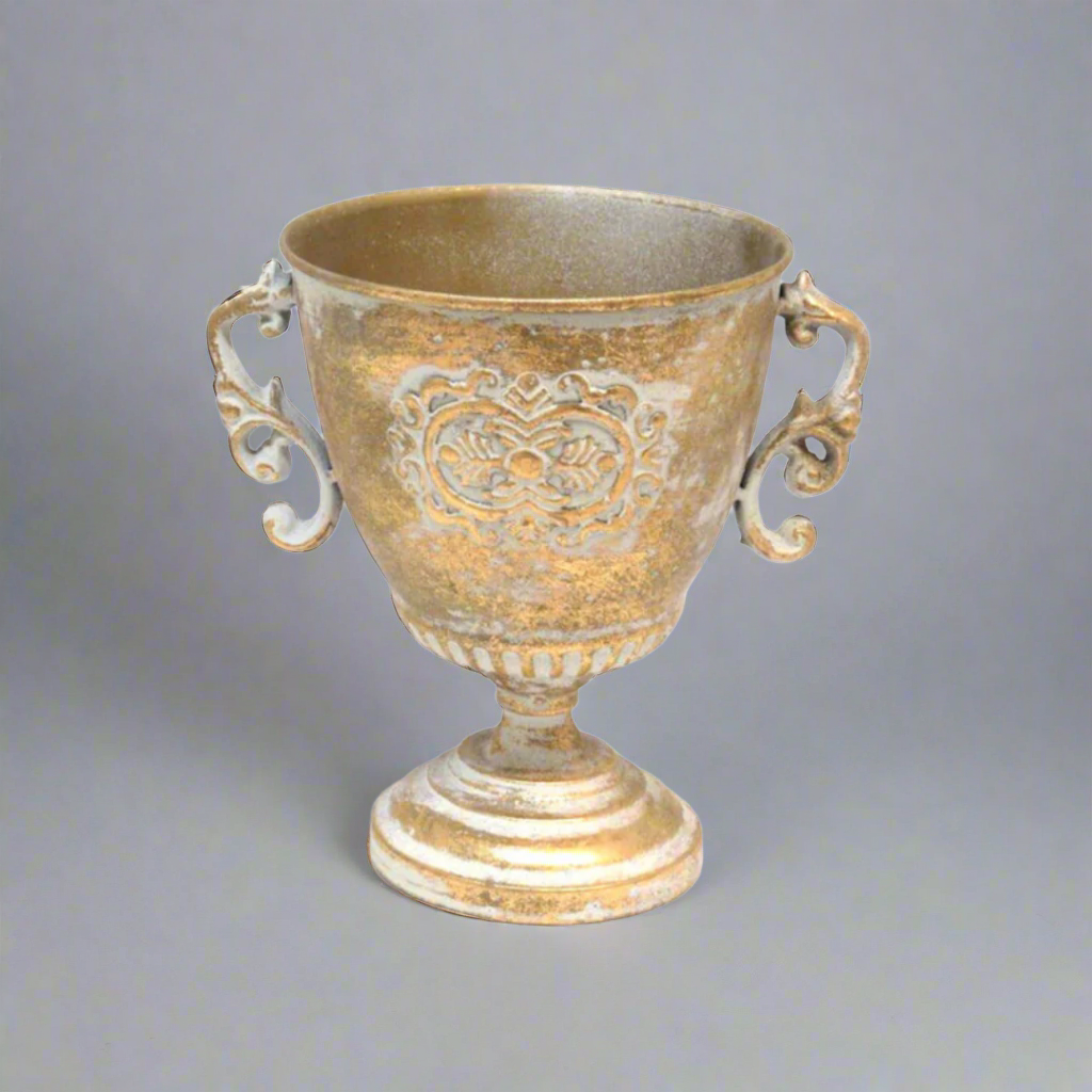 Add a Touch of Elegance with the Solo Pot
Elevate your home decor with the Solo Pot, a stunning multi-functional piece made of antique gold metal. This beautifully crafted pot is perfect for adding a touch of sophistication to any room.