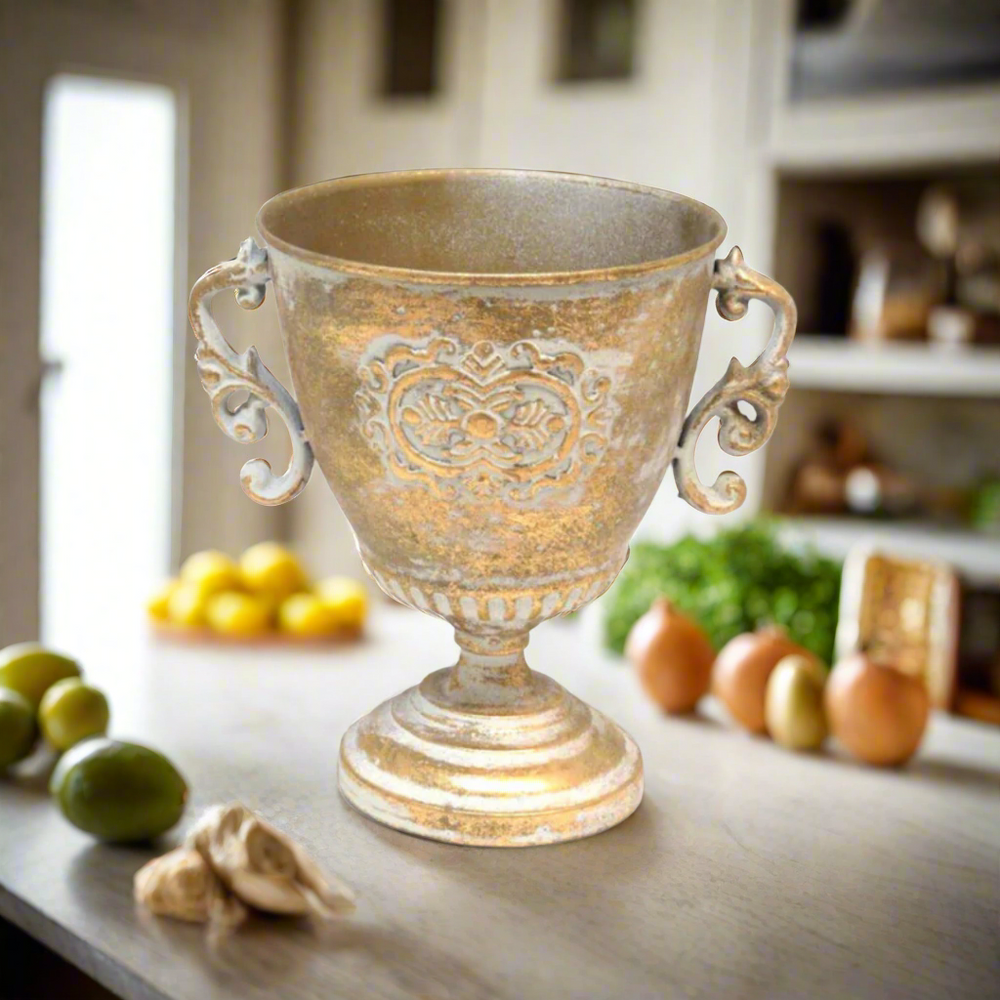 Add a Touch of Elegance with the Solo Pot
Elevate your home decor with the Solo Pot, a stunning multi-functional piece made of antique gold metal. This beautifully crafted pot is perfect for adding a touch of sophistication to any room.