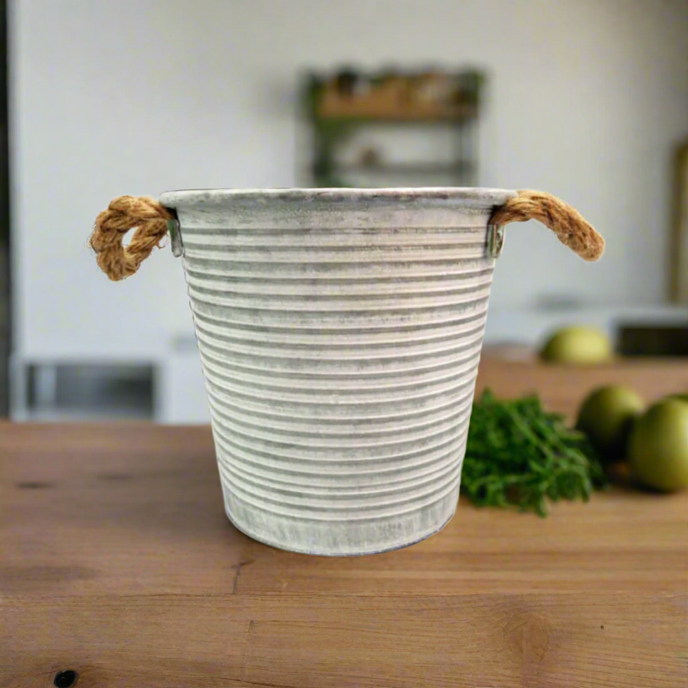 Introducing the Somerset Bucket
Vintage Charm for Your Home Decor
Add a touch of history and elegance to your space with the Somerset Bucket, a versatile antique-style pot perfect for indoor and outdoor use. With its spacious 21.5cm x 16cm x 20cm size, create stunning arrangements with your favorite flowers and foliage.