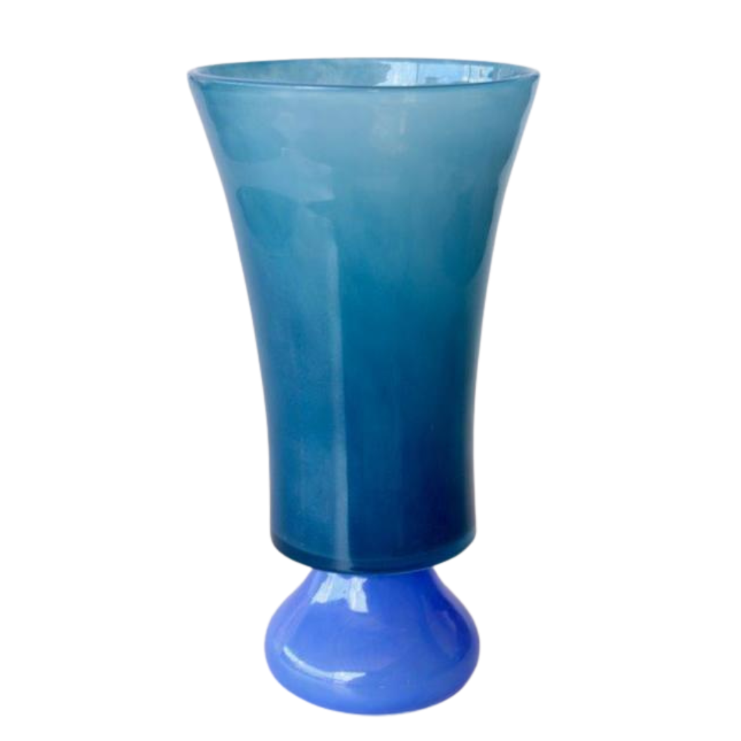 Tall 2-Tone Blue Glass Vase (34cm x 18cm)
Elevate your space with this stunning Tall 2-Tone Blue Glass Vase, expertly crafted to add a vibrant touch to any room. Its unique design and high-quality material make it perfect for displaying flowers or as a standalone decorative piece.Unique Boys.