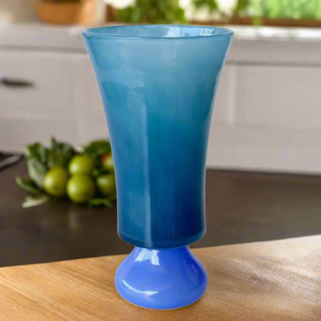 Tall 2-Tone Blue Glass Vase (34cm x 18cm)
Elevate your space with this stunning Tall 2-Tone Blue Glass Vase, expertly crafted to add a vibrant touch to any room. Its unique design and high-quality material make it perfect for displaying flowers or as a standalone decorative piece.Unique Boys.
