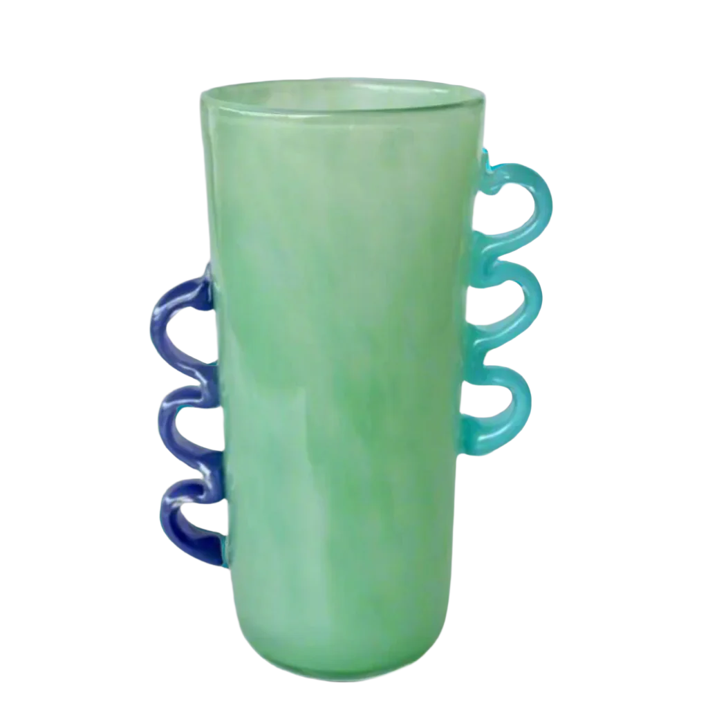 Tall Green Glass Vase with Purple & Blue Handles
Elevate your home decor with this stunning Tall Green Glass Vase, featuring vibrant purple and blue handles. Its unique design and beautiful green hue make it perfect for displaying flowers or as a standalone decorative piece.Unique Boys.