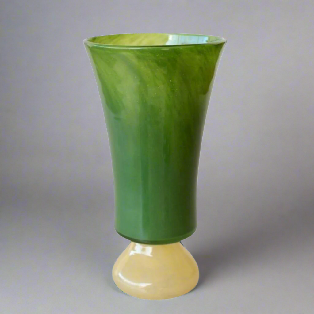 Tall Green & Yellow Glass Vase with Unique Handles
Elevate your home decor with this stunning glass vase, featuring vibrant green and yellow hues and stylish handles. Perfect for adding a pop of color and sophistication to any room. Unique Boys.