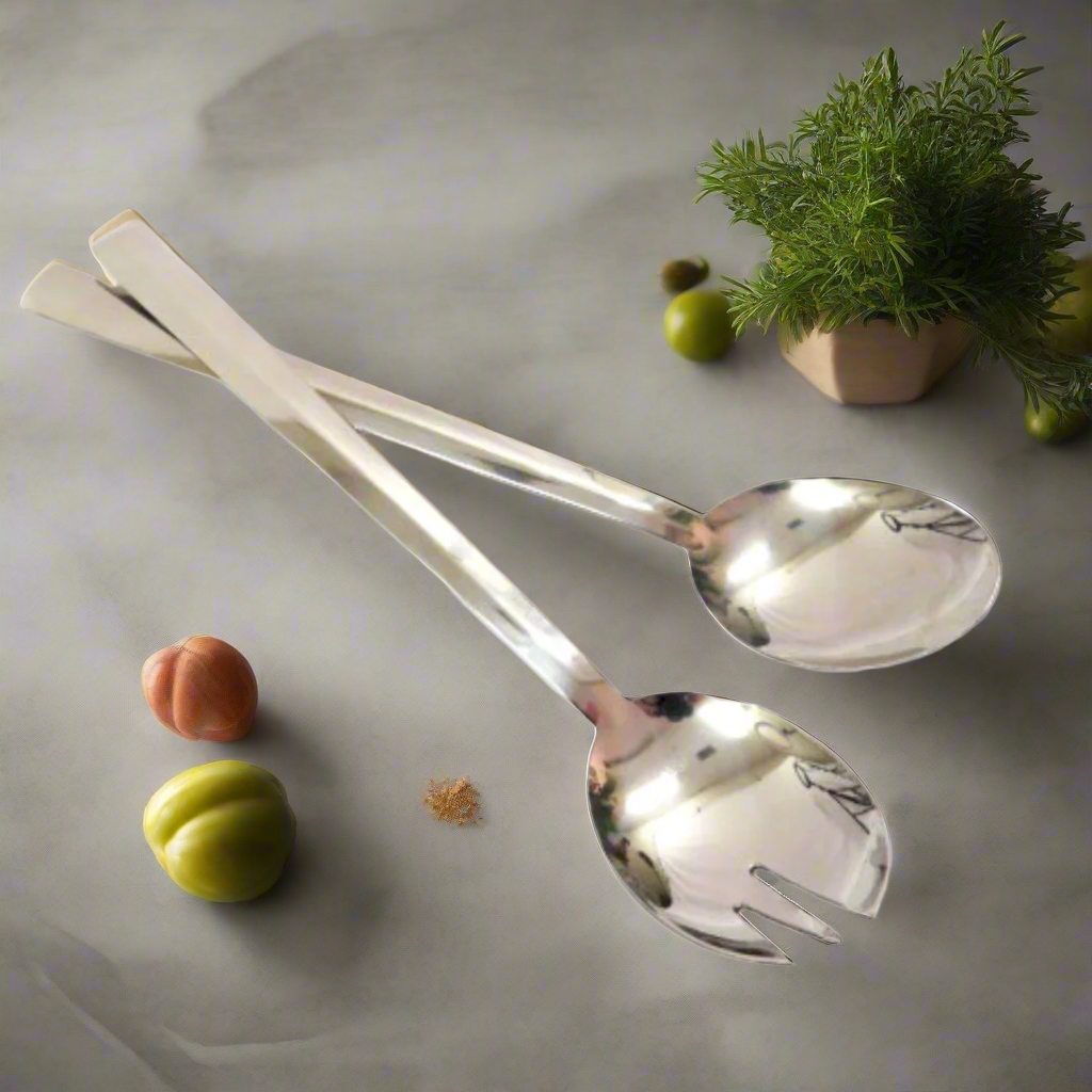 Elevate Your Dining Experience with Traderoutes Salad Servers
Add a touch of sophistication to your kitchen and dining table with these expertly crafted Traderoutes Salad Servers. Made from high-quality, sleek stainless steel, these servers are designed to provide a perfect balance of functionality and style.