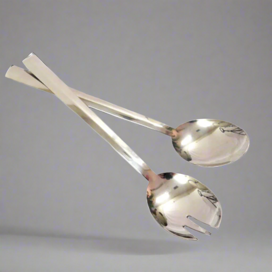 Elevate Your Dining Experience with Traderoutes Salad Servers
Add a touch of sophistication to your kitchen and dining table with these expertly crafted Traderoutes Salad Servers. Made from high-quality, sleek stainless steel, these servers are designed to provide a perfect balance of functionality and style.