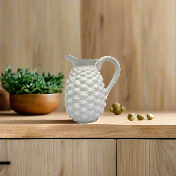 White Jade Pine Jug
Description
Elevate your home decor with the versatile and stylish White Jade Pine Jug. This elegant white jug can serve multiple purposes, from a planter to a decorative centerpiece.