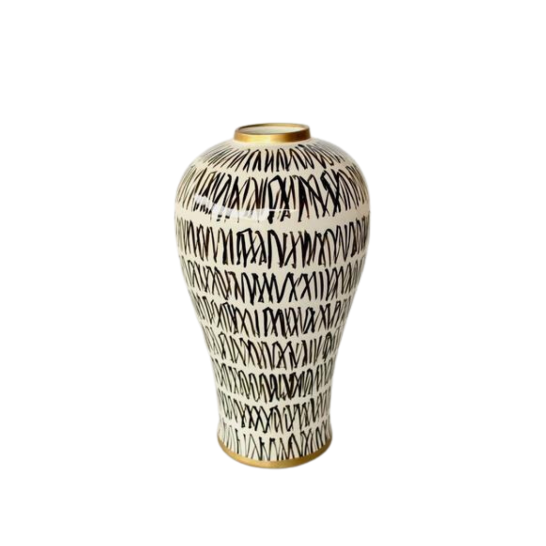 White with Black Design Vase
Elevate your home decor with this stunning White with Black Design Vase. Crafted from ceramic, it measures 43x23cm and features a sleek design that adds a touch of sophistication to any room. unique boys