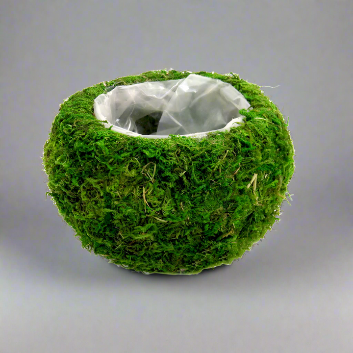 Product Description: Zara Ball Vase
Add a touch of greenery and freshness to any room with the beautiful Zara Ball Vase. This stunning, waterproof vase features a moss-covered exterior and a lined plastic interior, perfect for displaying small plants, flowers, or branches.