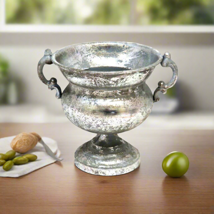 Padua Pot
Elevate your home decor with the exquisite Padua Pot, featuring a sophisticated design and intricate inlaid border!
Key Features:
Antique Footed Vase: Adds a touch of refinement to any setting
Intricate Inlaid Border: Showcases exceptional craftsmanship
Perfect Size: Measures 28.5cm (wide, including handles) x 23cm (diameter, without handles) x 19.5cm (height)