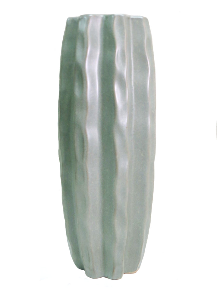 Bring the Outdoors In with the Epicenter Vase
Add a touch of natural beauty to your home with the stunning Epicenter vase. Crafted from long-lasting ceramic, this elegant vase is perfect for showcasing long-stemmed plants and greenery.
Perfect Showcase for Greenery
With its generous size (14.5cm D x 37cm H), the Epicenter vase provides ample space to display your favorite plants, branches, or flowers. Its sleek design makes it a perfect addition to any room, bringing a touch of the outdoors to your interior