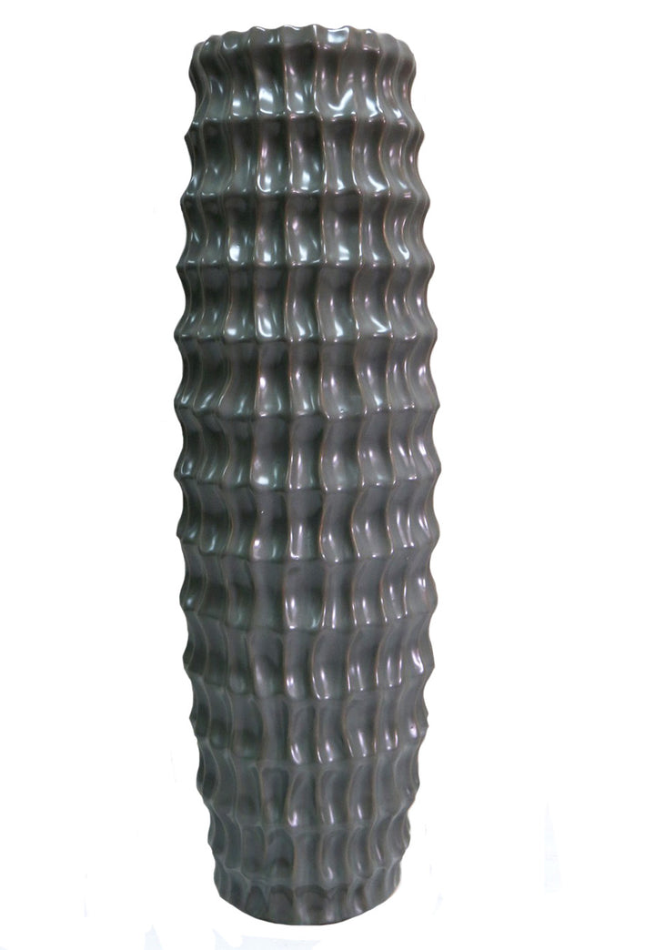 Kith Vase - Modern Ceramic Statement Piece
Make a statement in your decor with the striking and modern Kith vase. This stunning ceramic grey vase boasts a sleek design, perfect for showcasing longer stemmed blooms and greenery. With its impressive 16cm diameter x 50.5cm height, the Kith vase is sure to elevate your space.