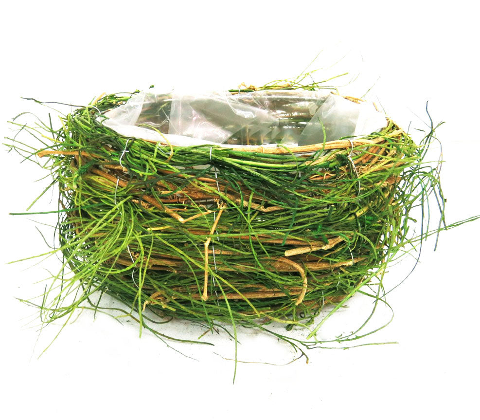 Willownest is a unique and beautiful planter, designed in the shape of a young sprouting willow. Crafted from natural woven material with plastic waterproofing, it is visible proof of nature's glory. With dimensions of 23 x 16 x 13 cm, Willownest brings nature's beauty to any room. Unique Boys