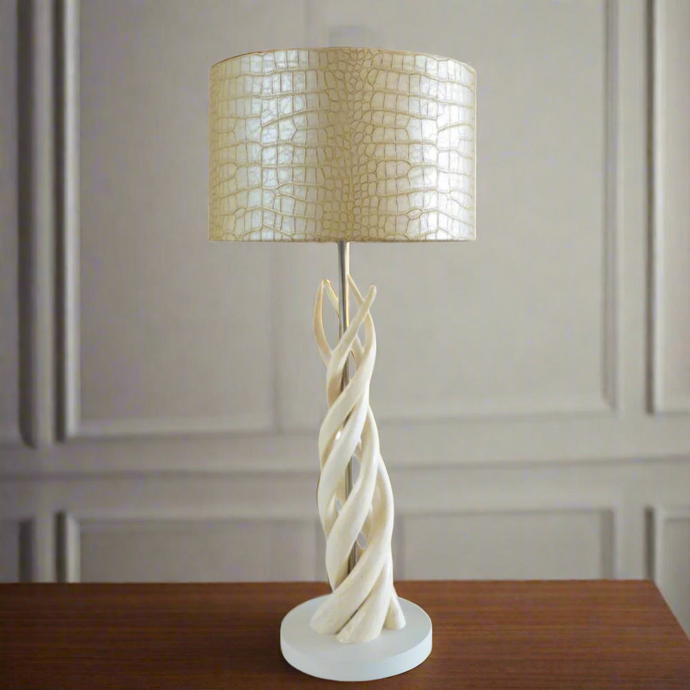Unique 4 Natural Kudu Horn Upright Twist Lamp with Tan Snake Shade
Bring the essence of the African savannah into your home or office with this breathtaking lamp. Featuring four expertly crafted natural kudu horn upright twists, topped with a tan snake fabric shade, this piece is a true masterpiece of South African craftsmanship. Unique Boys.