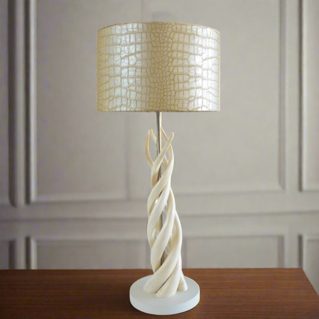 Unique 4 Natural Kudu Horn Upright Twist Lamp with Tan Snake Shade
Bring the essence of the African savannah into your home or office with this breathtaking lamp. Featuring four expertly crafted natural kudu horn upright twists, topped with a tan snake fabric shade, this piece is a true masterpiece of South African craftsmanship. Unique Boys.