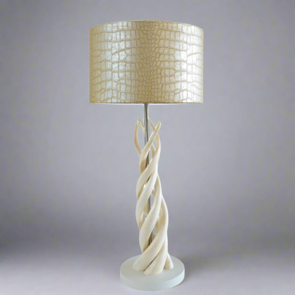 Unique 4 Natural Kudu Horn Upright Twist Lamp with Tan Snake Shade
Bring the essence of the African savannah into your home or office with this breathtaking lamp. Featuring four expertly crafted natural kudu horn upright twists, topped with a tan snake fabric shade, this piece is a true masterpiece of South African craftsmanship. Unique Boys.