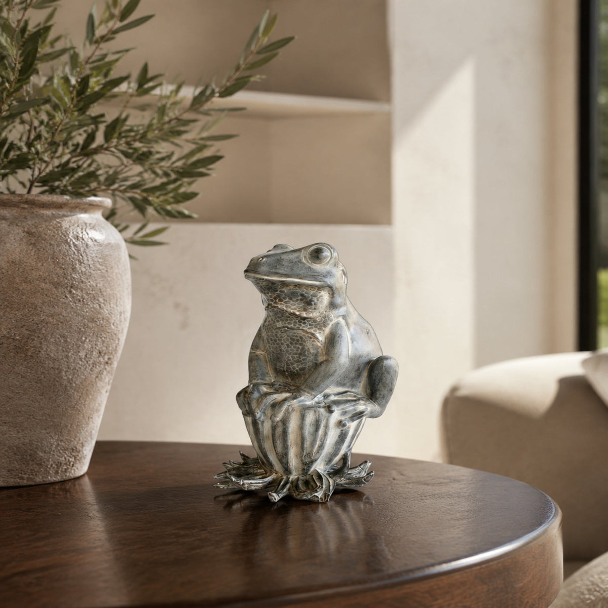 Frog sitting on seed pod 32X16cm - lifestyle view