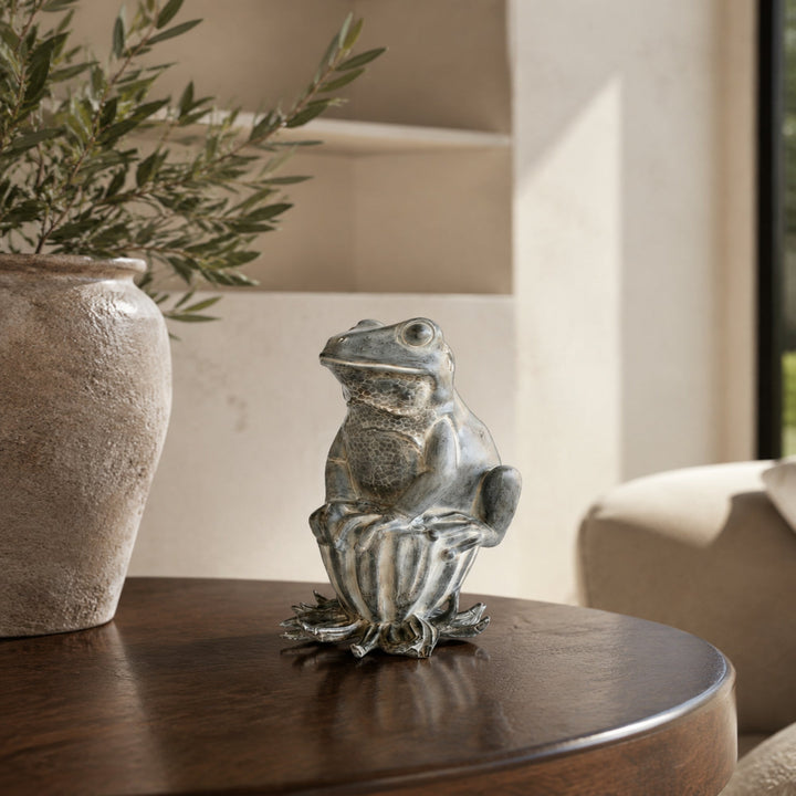 Frog sitting on seed pod 32X16cm - lifestyle view