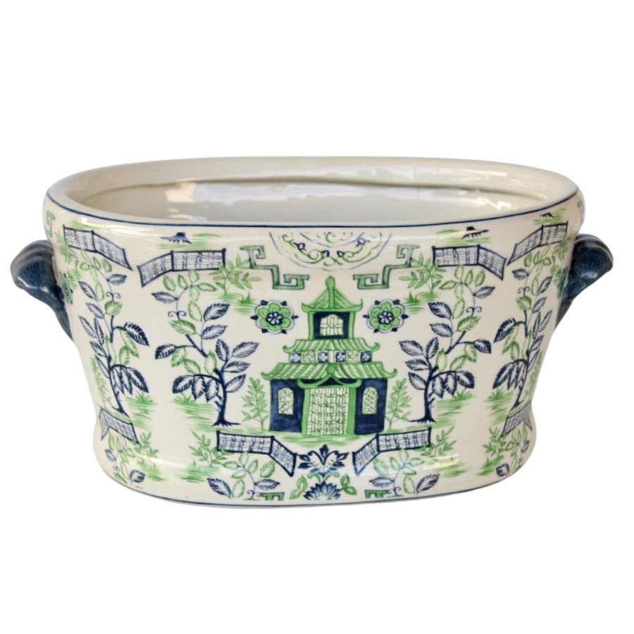 Blue &amp; Green Pagoda Foot Bath Planter
Add a touch of serenity to your outdoor space with the Blue &amp; Green Pagoda Foot Bath Planter. This ceramic planter features a classic pagoda design and measures 20x41x27cm. Durable and water-resistant, it's perfect for accentuating your outdoor decor or as a functional foot bath. www.uniqueboys.co.za