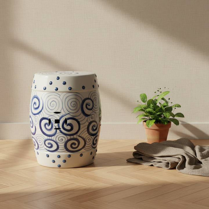 This beautiful ceramic garden stool with its blue and white circle pattern adds a unique touch of elegance to any outdoor or indoor space. Crafted from durable ceramic, this piece can stand up to the elements with ease and provides 43x30cm of seating space. 