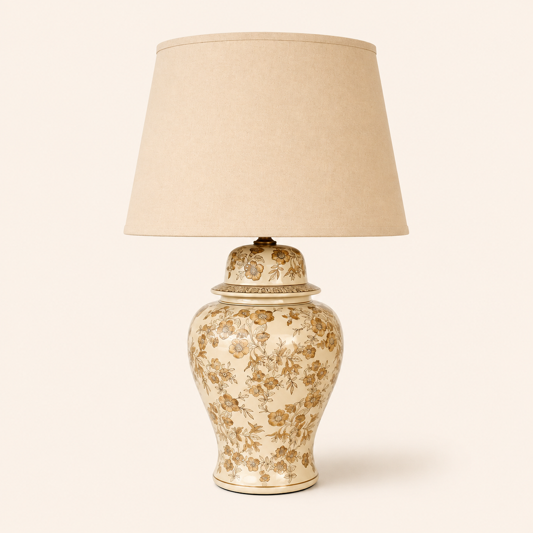 Add refined charm with this Beige Floral Embossed Lamp, featuring a decorative ceramic base and elegant beige shade.
