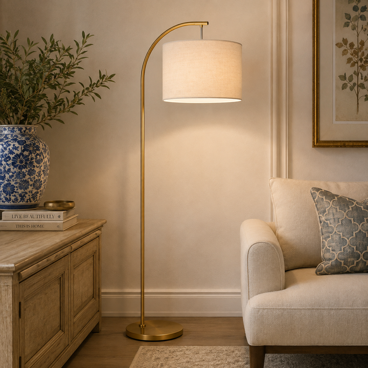 Add sophisticated lighting with the Benny Arch Floor Lamp Gold, complete with a timeless neutral linen shade.