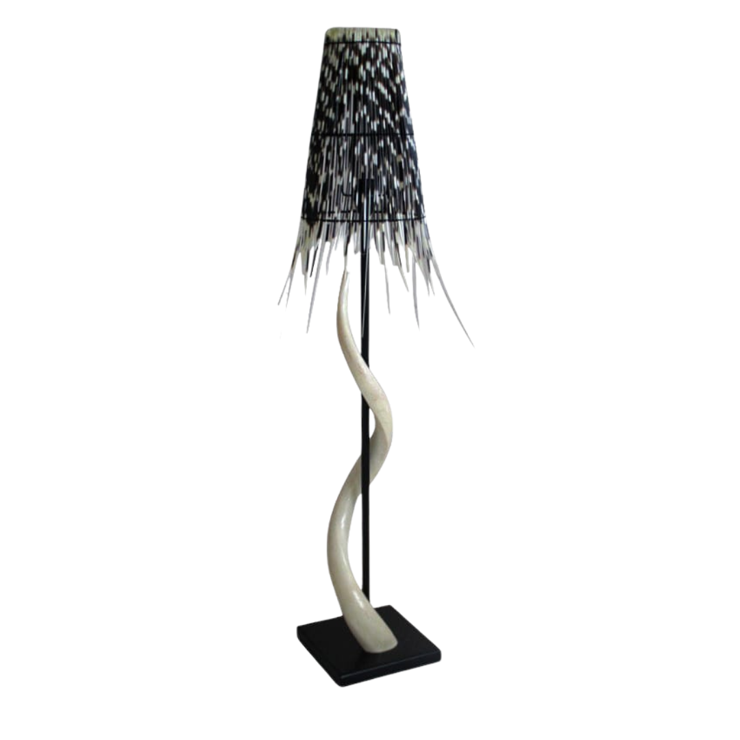 Majestic Black Base Kudu Inner Horn Lamp with Quill Shade
Elevate your space with the striking beauty of African wildlife. This stunning lamp features intricately crafted kudu inner horns set on a sleek black base, paired with a unique cone-shaped quill shade that adds a touch of natural elegance. Unique Boys.