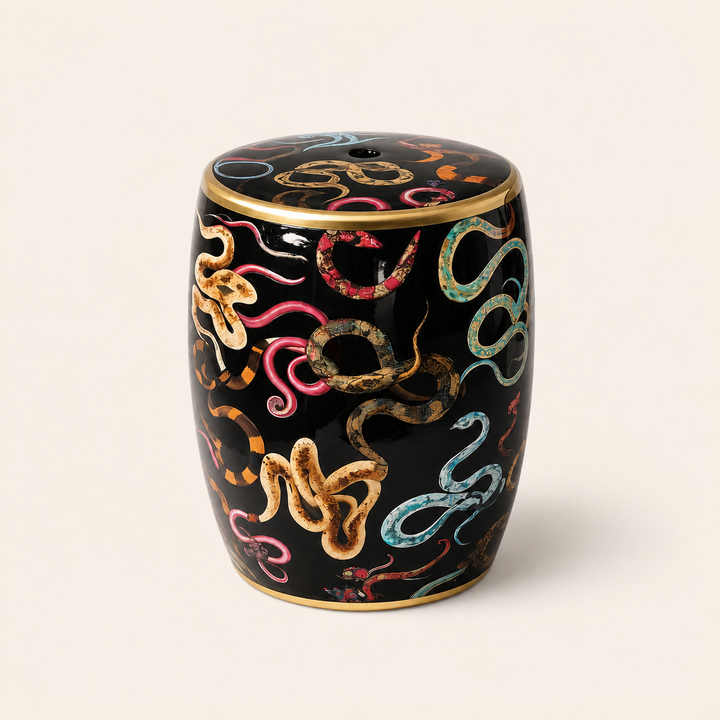 Statement ceramic garden stool with colourful snakes design, ideal as a side table or accent piece.