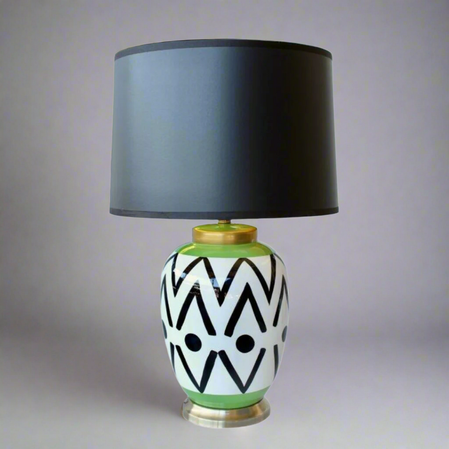 Elegant Black, Green & White Detail Lamp Base
Transform your space into a masterpiece with this stunning lamp base from Unique Boys. Featuring a unique blend of black, green, and white hues, paired with a sleek black shade, this lamp is a true showstopper. www.uniqueboys.co.za