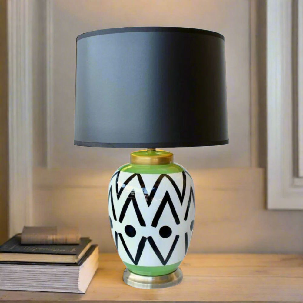 Elegant Black, Green & White Detail Lamp Base
Transform your space into a masterpiece with this stunning lamp base from Unique Boys. Featuring a unique blend of black, green, and white hues, paired with a sleek black shade, this lamp is a true showstopper. www.uniqueboys.co.za