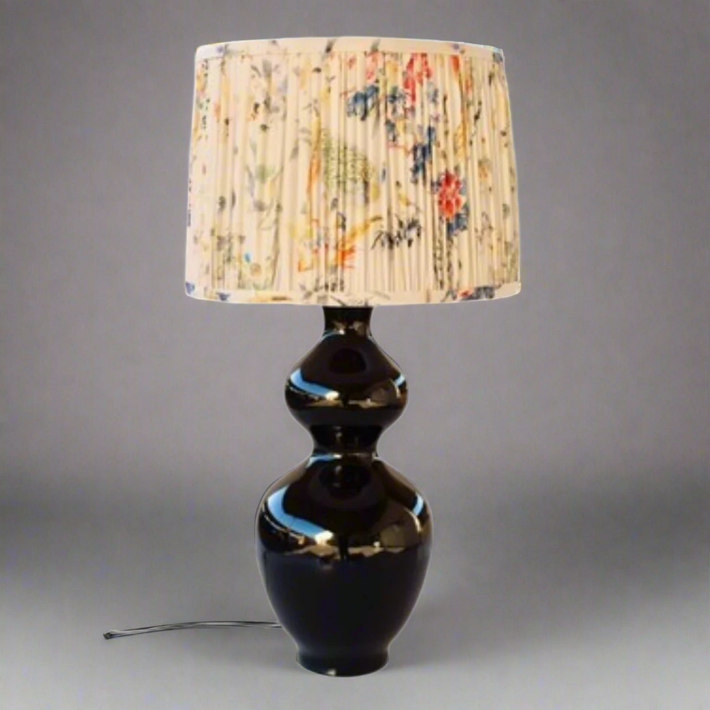 Black Lamp Base With Floral Bird Lamp Shade
Elevate your home decor with our exquisite Black Lamp Base paired with a stunning Floral Bird Lamp Shade. This unique lamp combines sleek lines with intricate design elements, creating a captivating piece that's sure to draw attention in any room. Measuring 66cm in height and 35cm in width, this lamp is perfectly sized for living rooms, bedrooms, or offices.www.uniqueboys.co.za