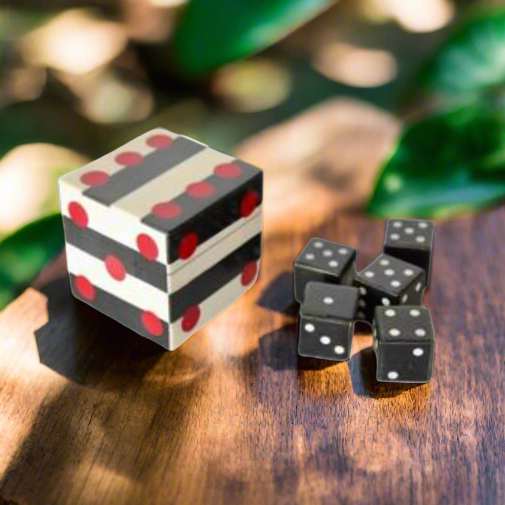 Black, White & Red Box with 5 Dice
Add excitement to your game nights with this sleek Black, White & Red Box with 5 Dice, measuring 8.5 x 8.5 x 8.5 cm. Perfect for board game enthusiasts and casual players alike, this set includes five dice for various games like Yahtzee, Liar's Dice, Craps, Farkle, and more.Unique Boys