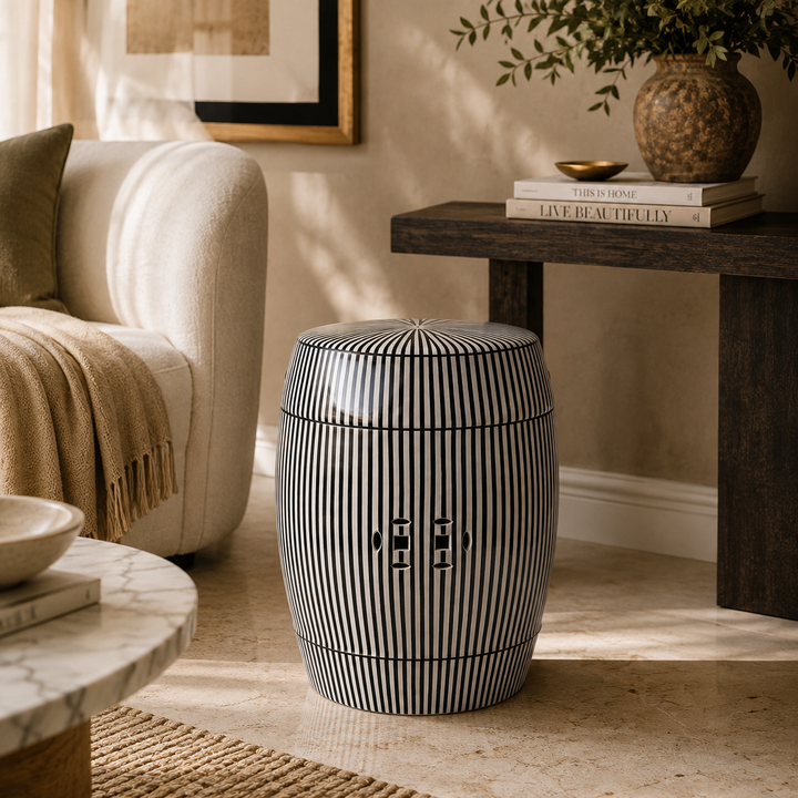 Elegant striped ceramic garden stool with a glossy finish for contemporary indoor living spaces.