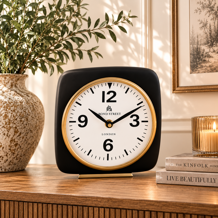 Elegant Black and Brass Table Clock 16 x 16cm with bold numerals and classic Bond Street London styling.