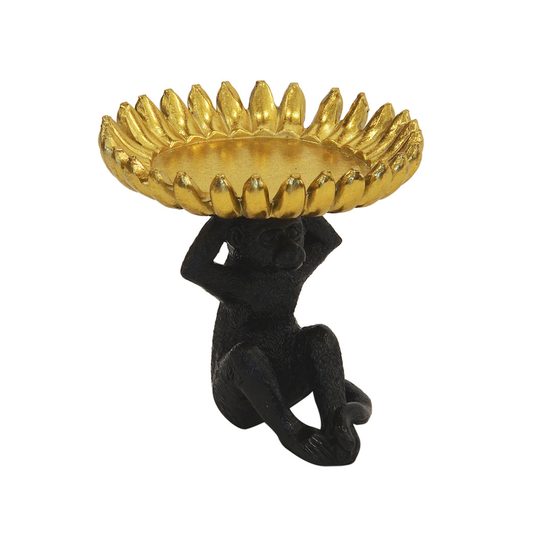Black and Gold Resin Monkey Banana Bowl (Small)
Elevate your home decor with this exquisite resin monkey banana bowl, expertly crafted to add a touch of whimsy and sophistication to any room. Perfect for snacking, storing small items, or as a decorative centerpiece, this charming bowl features a striking black and gold design that's sure to spark conversations.
Product Details:
Size: 13cm x 13cm (5.1 inches x 5.1 inches)
Material: High-quality resin, ensuring durability and longevity
