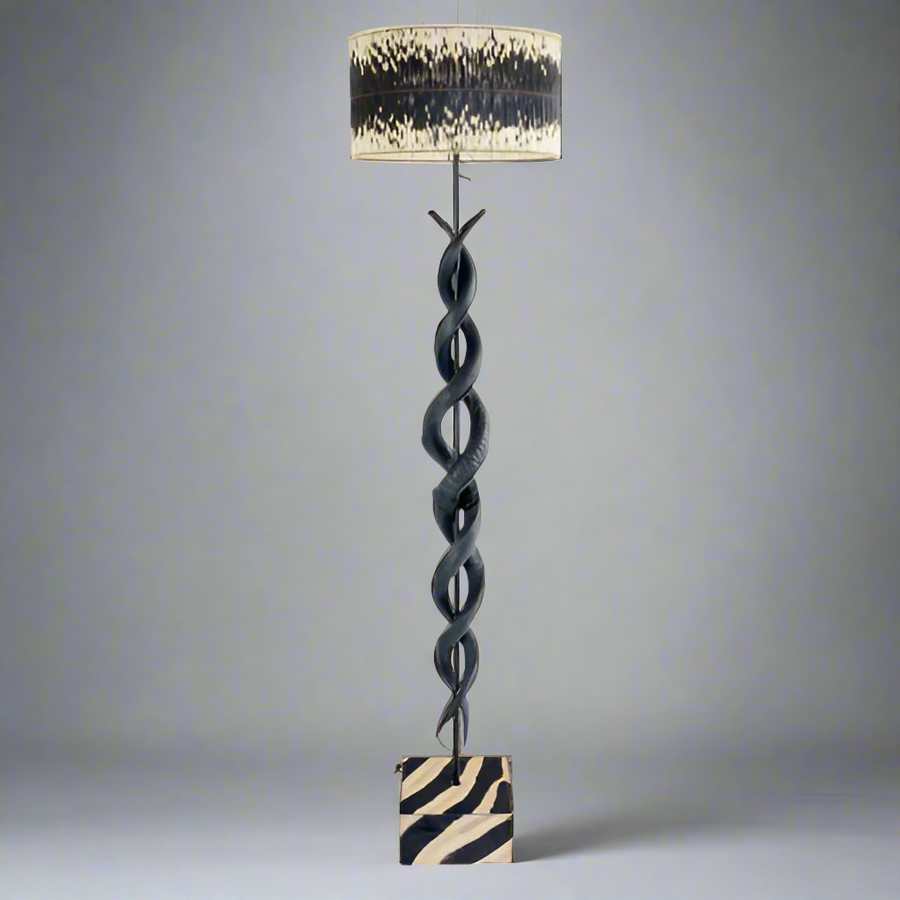 Black Kudu Horn Double Twist Standing Lamp with Quill Drum Shade
Make a statement in your home with this stunning Black Kudu Horn Double Twist Standing Lamp, paired with a unique quill drum shade. Handmade with pride in South Africa by Unique Boys, this floor lamp showcases exceptional craftsmanship and adds a touch of African elegance to any room.www.uniqueboys.co.za