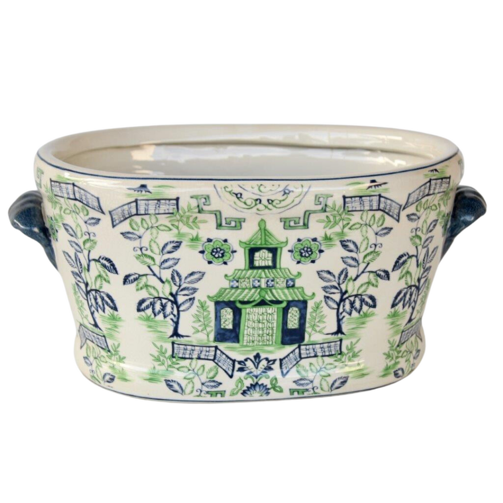 Blue & Green Pagoda Foot Bath Planter
Add a touch of serenity to your outdoor space with the Blue &amp; Green Pagoda Foot Bath Planter. This ceramic planter features a classic pagoda design and measures 20x41x27cm. Durable and water-resistant, it's perfect for accentuating your outdoor decor or as a functional foot bath. www.uniqueboys.co.za