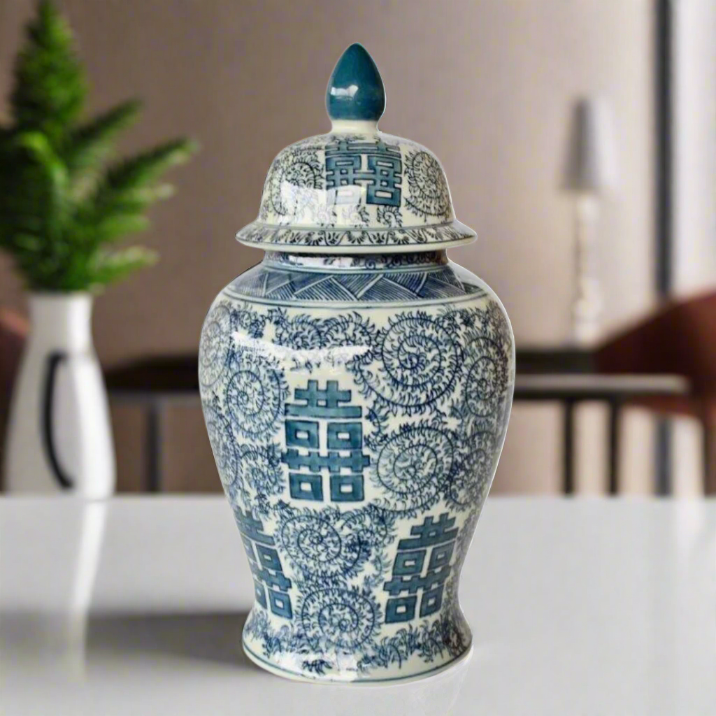 Timeless Elegance: Blue &amp; White Chinese Ginger Jar
Add a touch of sophistication and cultural heritage to your home decor with the Blue &amp; White Chinese Ginger Jar, a beautifully crafted piece that combines elegance and tradition. Measuring 48x22cm, this stunning jar features an intricate blue and white Chinese design with delicate patterns, expertly crafted with high-quality ceramic glaze for durability and longevity.www.uniqueboys.co.za