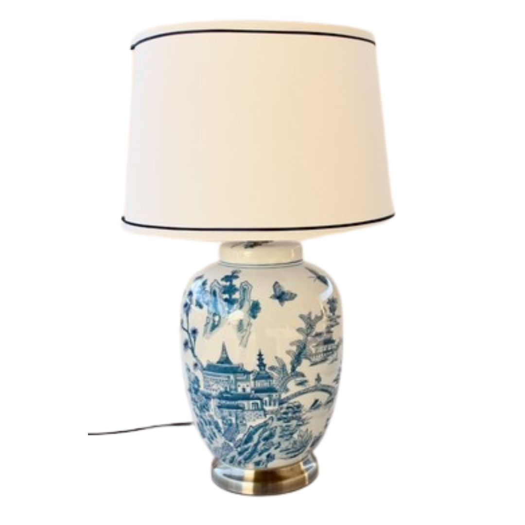 Blue &amp; White Chinese Lamp Base With Blue Trim Shade 63X38cm
Add a touch of elegance and sophistication to your home decor with our stunning Blue &amp; White Chinese Lamp Base With Blue Trim Shade. This captivating lamp features sleek lines and intricate design elements, making it a perfect conversation starter for any room. Unique Boys.