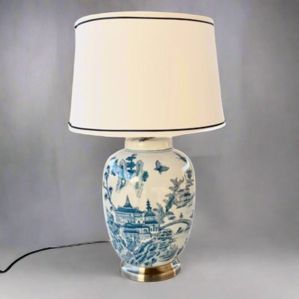 Blue &amp; White Chinese Lamp Base With Blue Trim Shade 63X38cm
Add a touch of elegance and sophistication to your home decor with our stunning Blue &amp; White Chinese Lamp Base With Blue Trim Shade. This captivating lamp features sleek lines and intricate design elements, making it a perfect conversation starter for any room. Unique Boys.